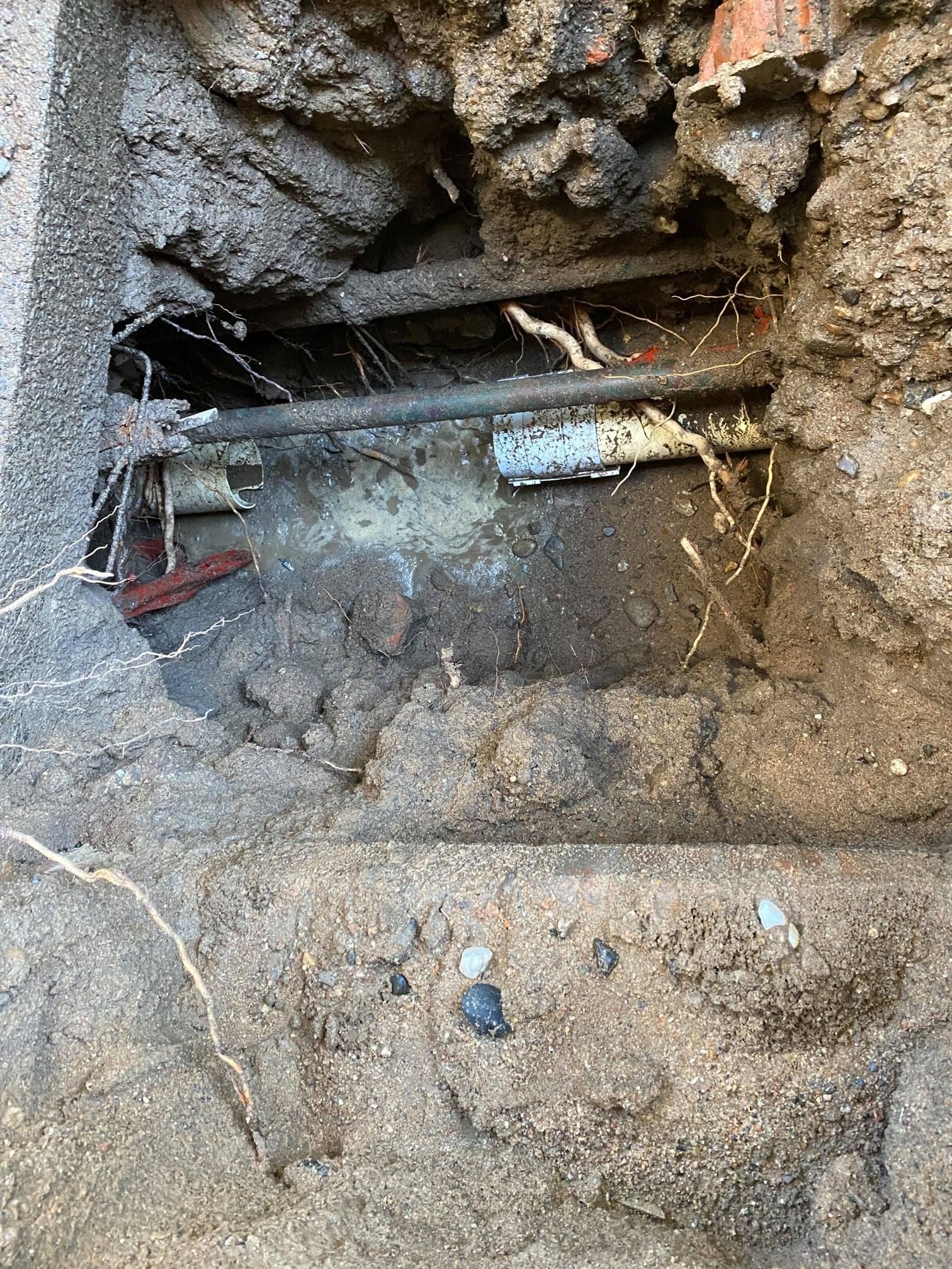 Excavated Area Reveals Pipes — Expert Plumbing & Solar Services Bathurst in Kelso, NSW