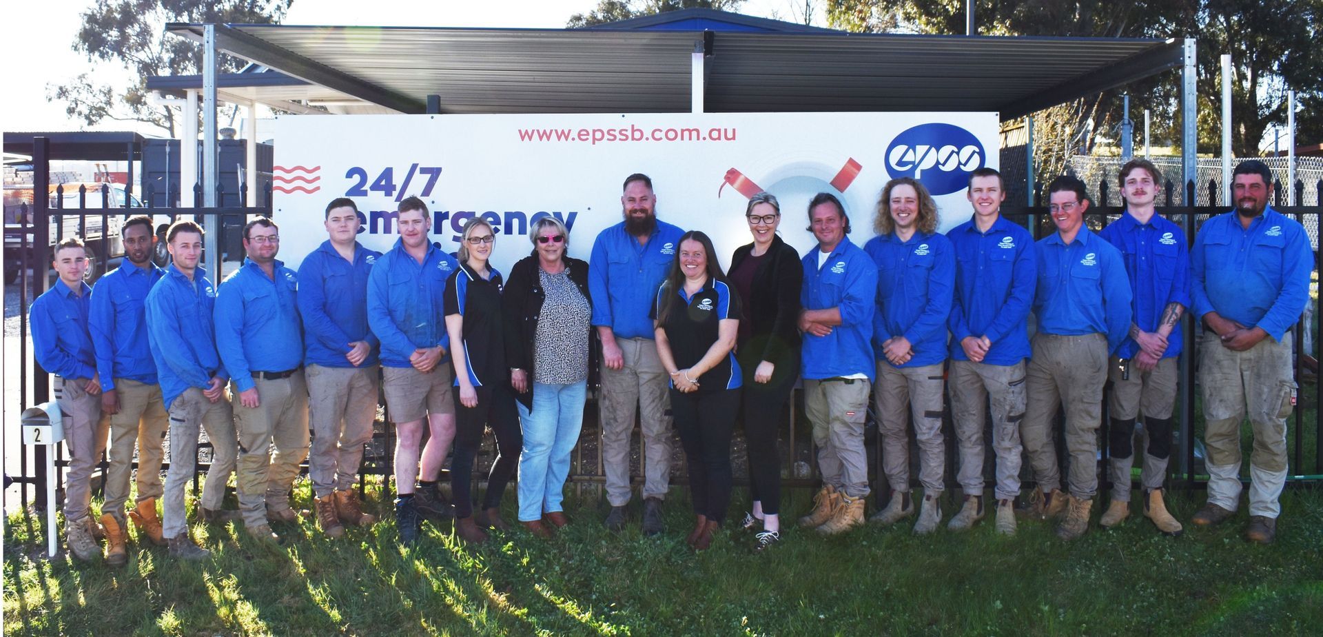 A Group of People Wearing Blue Shirts and Khaki Pants — Expert Plumbing & Solar Services Bathurst in Kelso, NSW