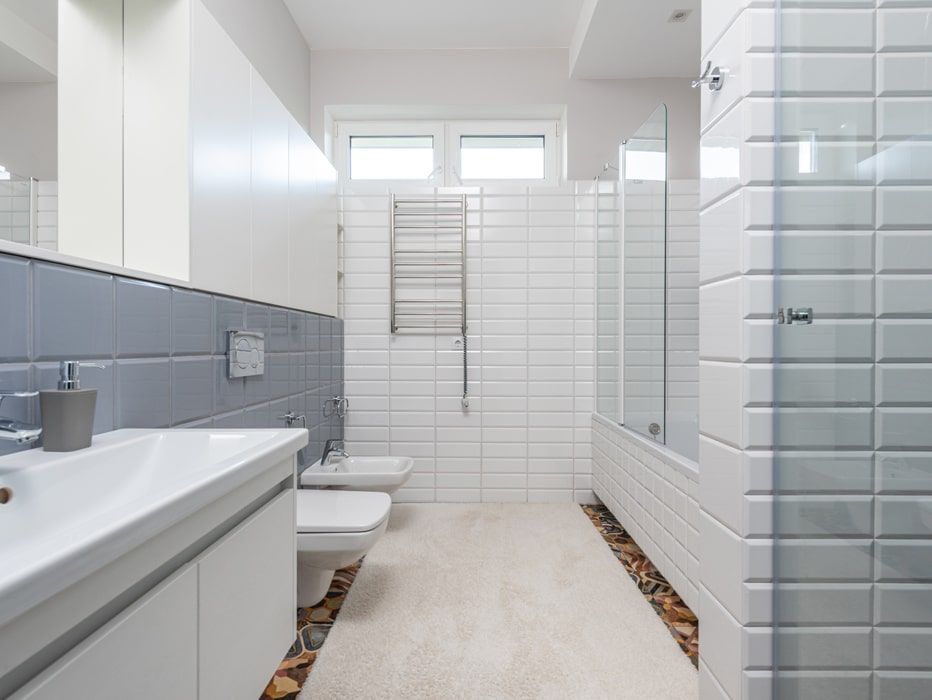 Modern White and Gray Bathroom — Expert Plumbing & Solar Services Bathurst in Kelso, NSW