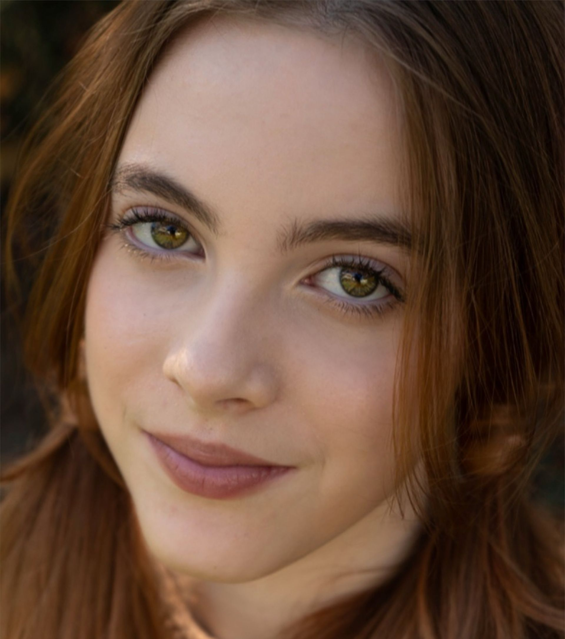 Woman with arm around boy's shoulder, watching sunset over ocean Jelena's Photo.