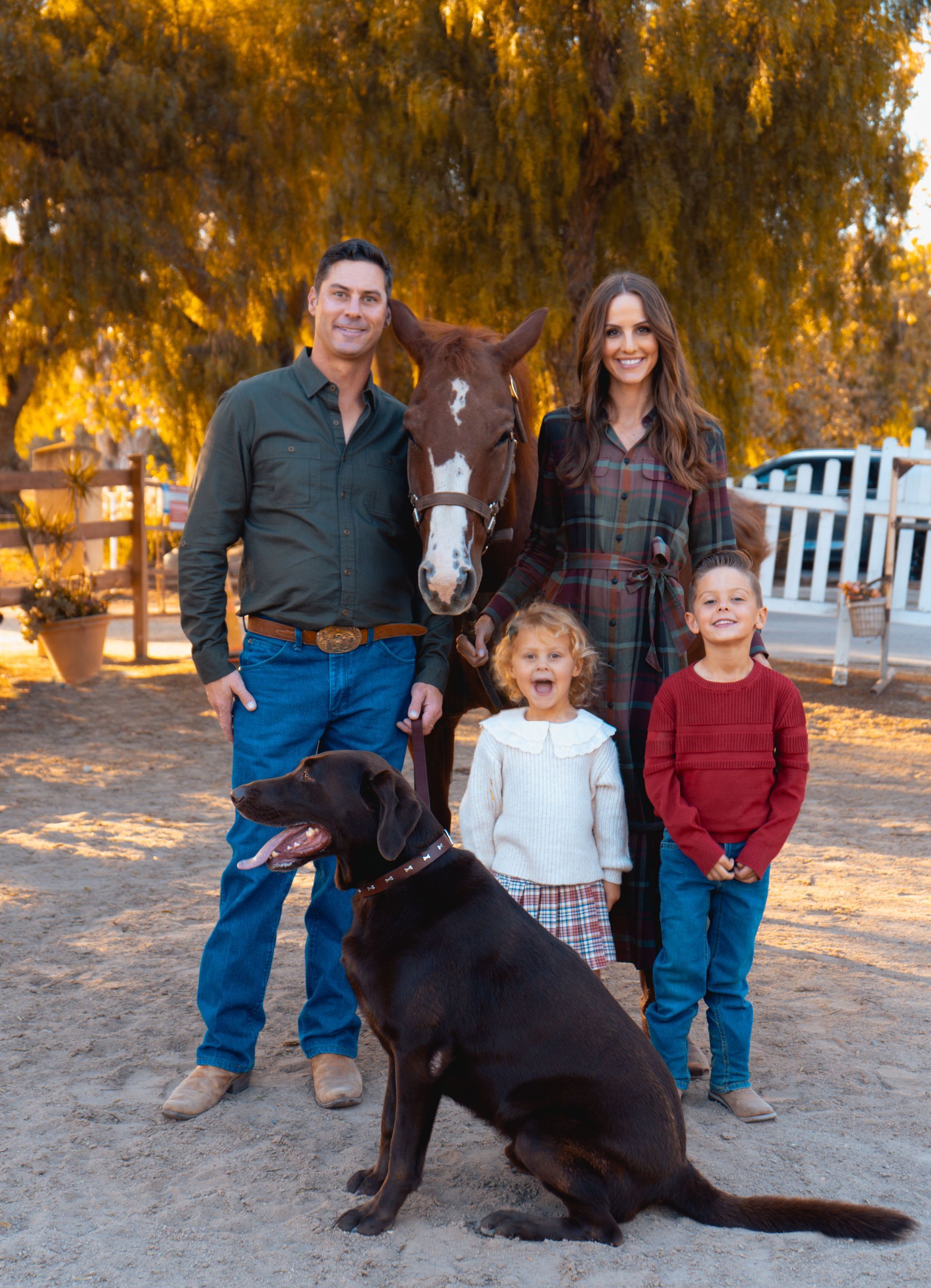 Young couple with the horse in San Juan Capistrano. Family Portrait by Jelena's Photo.