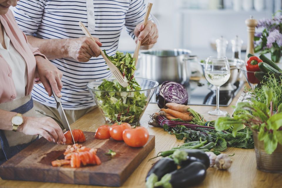 senior family preparing a healthy dinner