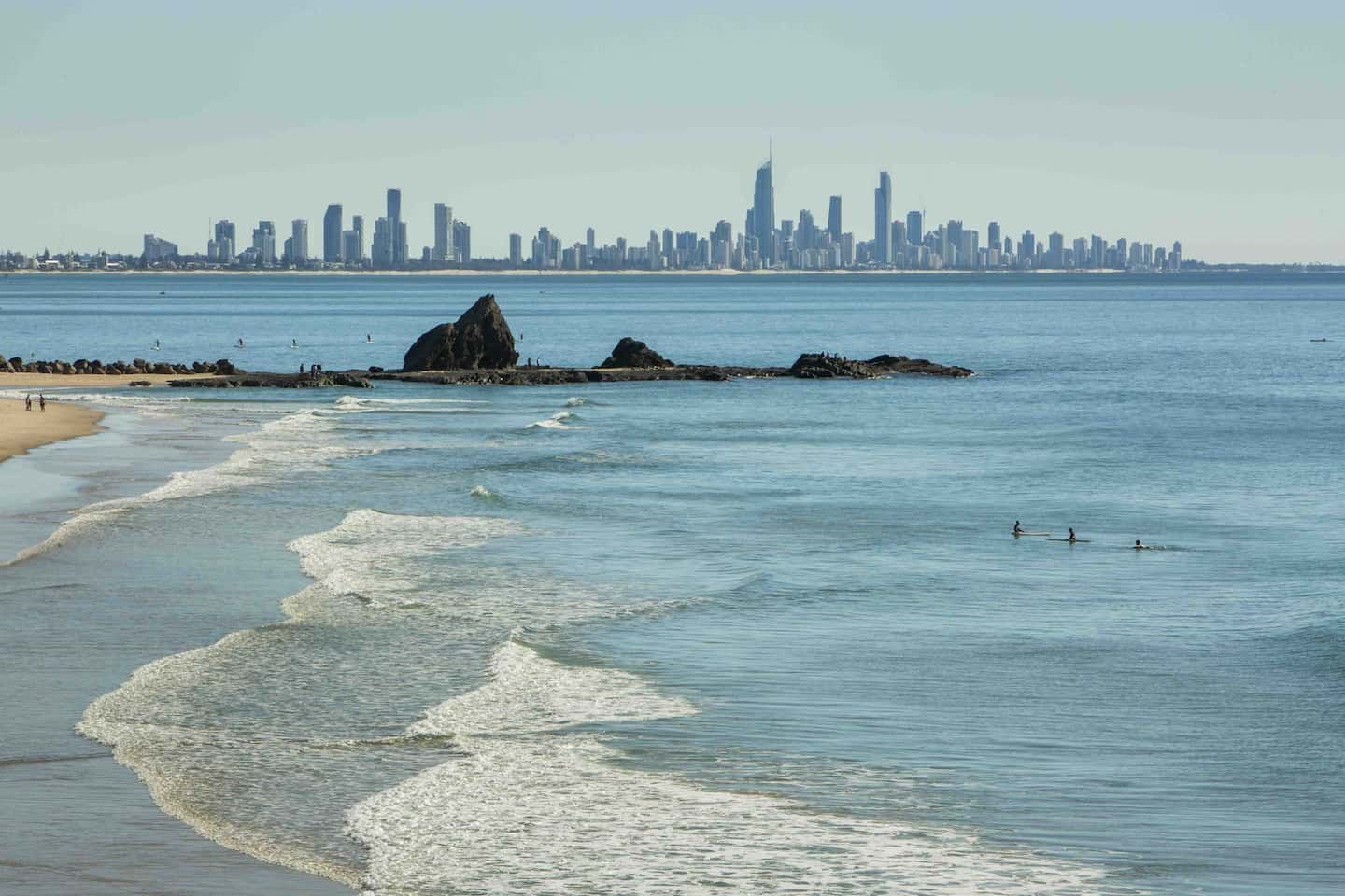 A Beach With a City Skyline in the Background — O'Grady's Transport & Removals in Gold Coast, NSW