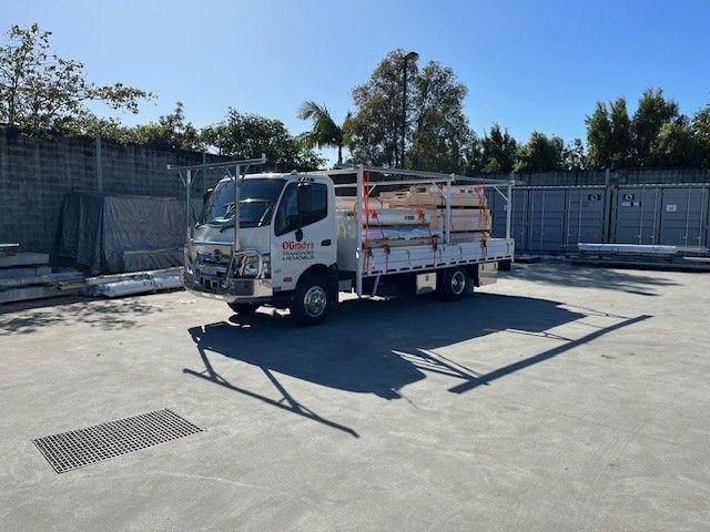 A White Truck is Parked in a Parking Lot — O'Grady's Transport & Removals in Alstonville, NSW