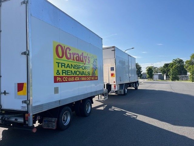 Two O'Grady's Transport and Removals Trucks — O'Grady's Transport & Removals in Gold Coast, NSW