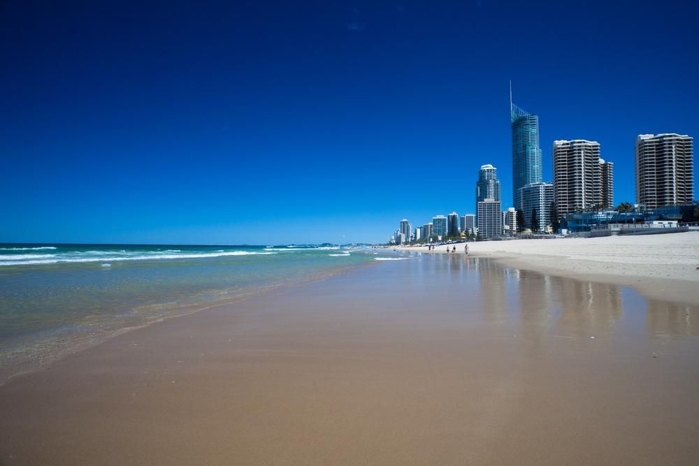 A Beach With a City Skyline in the Background — O'Grady's Transport & Removals in Gold Coast, NSW