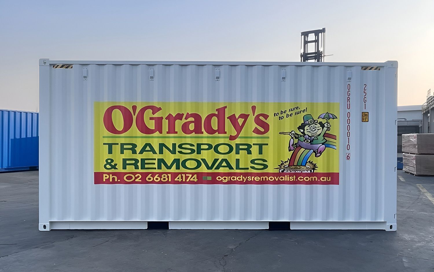 A White Shipping Container Featuring The 