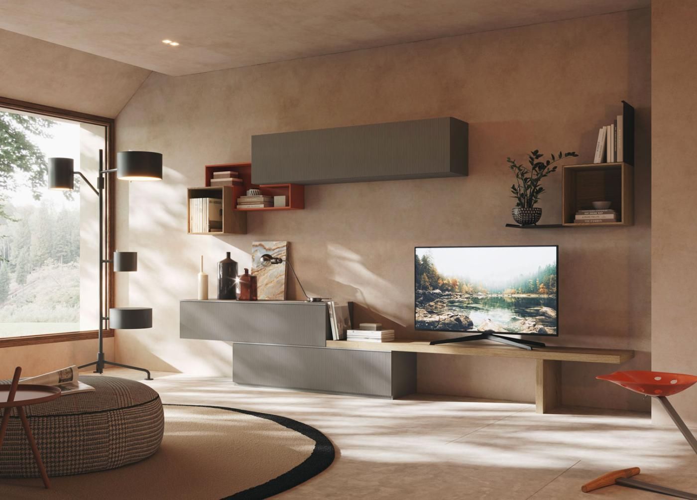 Un soggiorno con una TV a schermo piatto su un supporto.