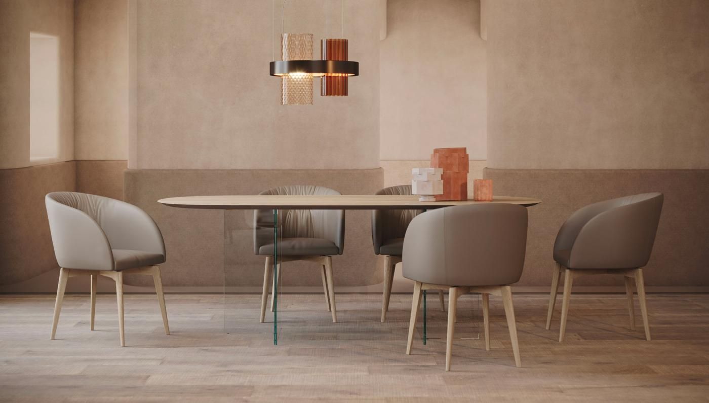 Una sala da pranzo con un tavolo e delle sedie.