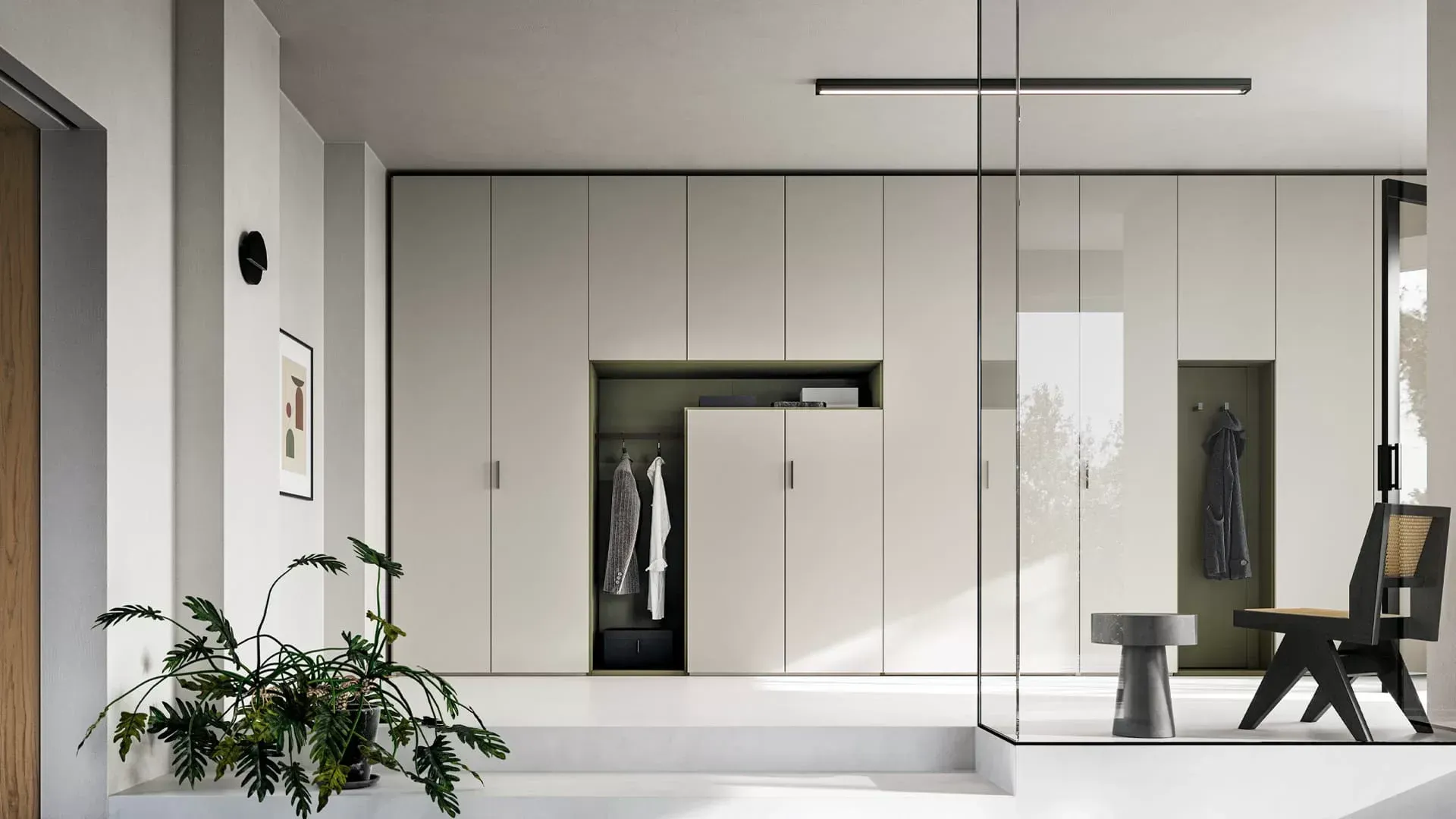 Una stanza con un sacco di armadi e una sedia.