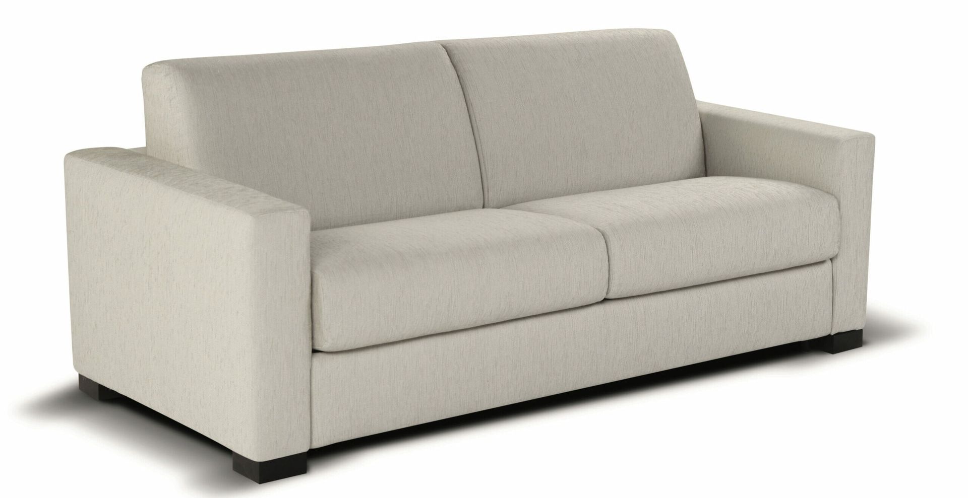 Un divano bianco è appoggiato su uno sfondo bianco.