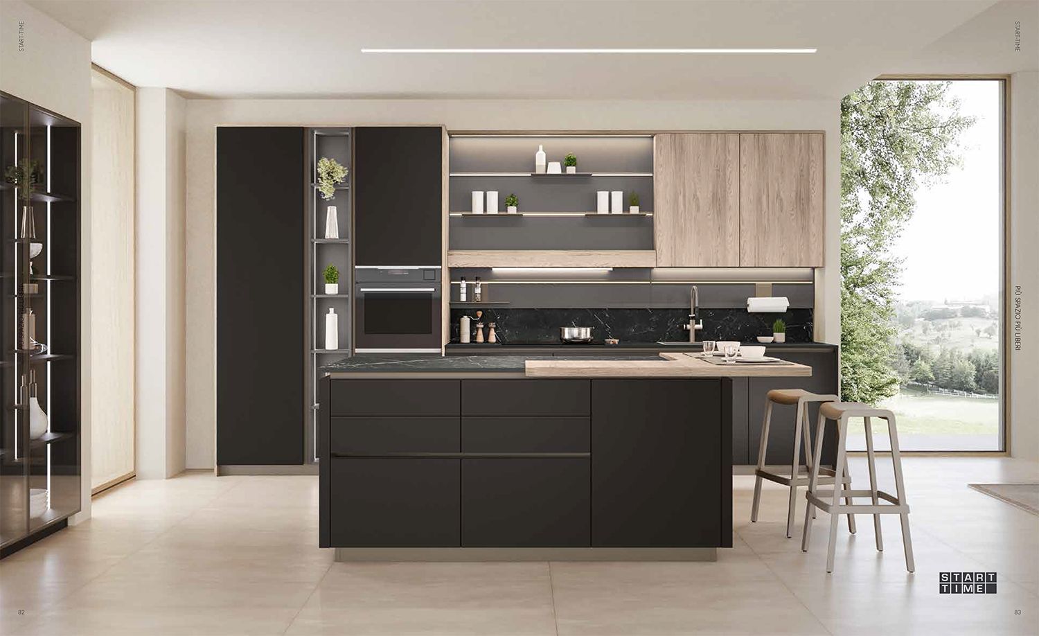 Una cucina con mobili neri e una grande isola al centro.