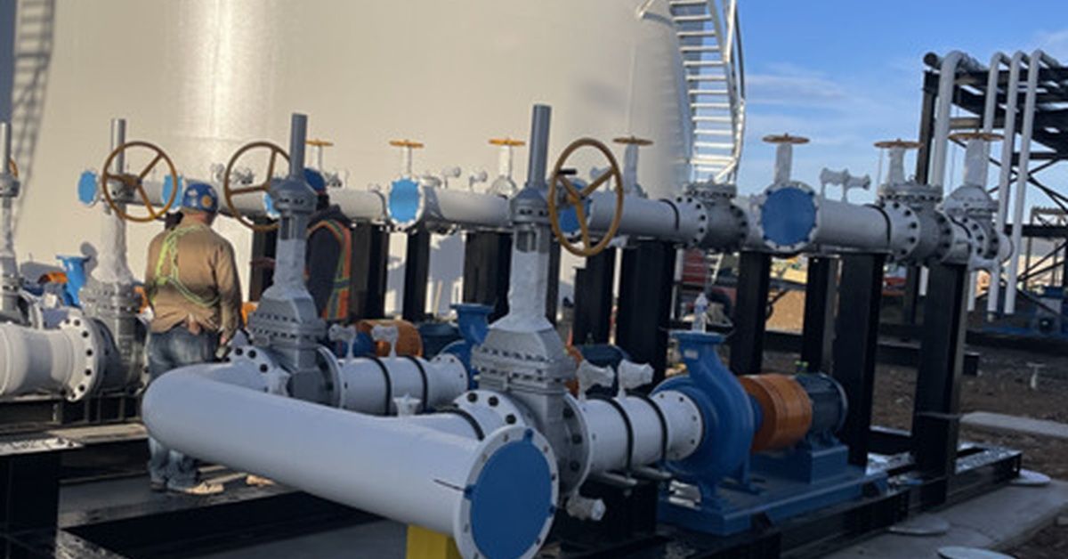 Sunlight shining into a modular construction facility. Several building sections are built inside th