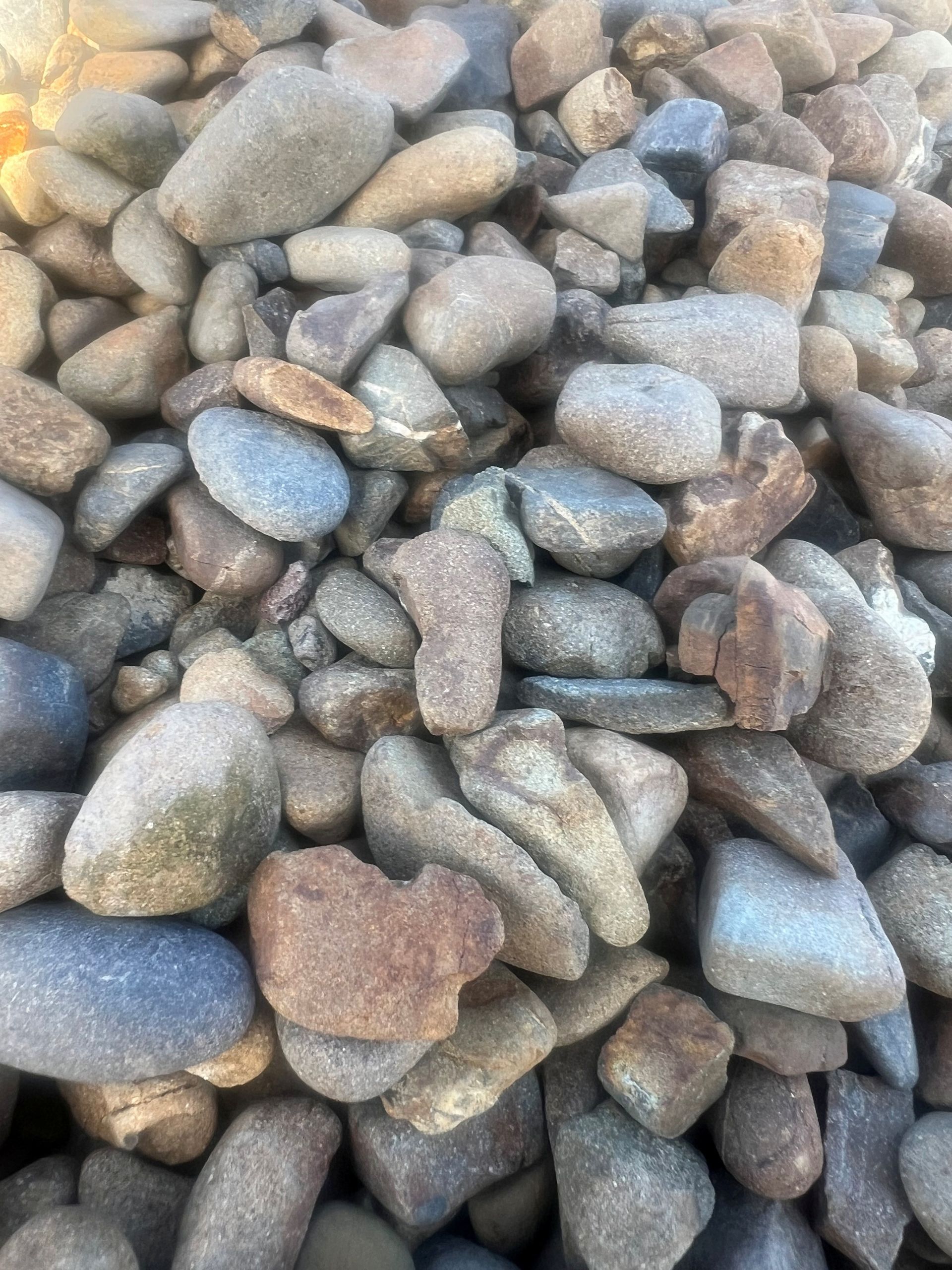 A pile of wood shavings is sitting on a table.