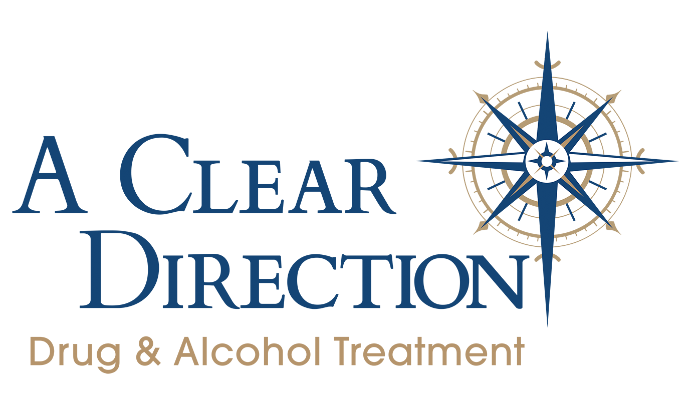 A clear direction drug and alcohol treatment logo with a compass on it.