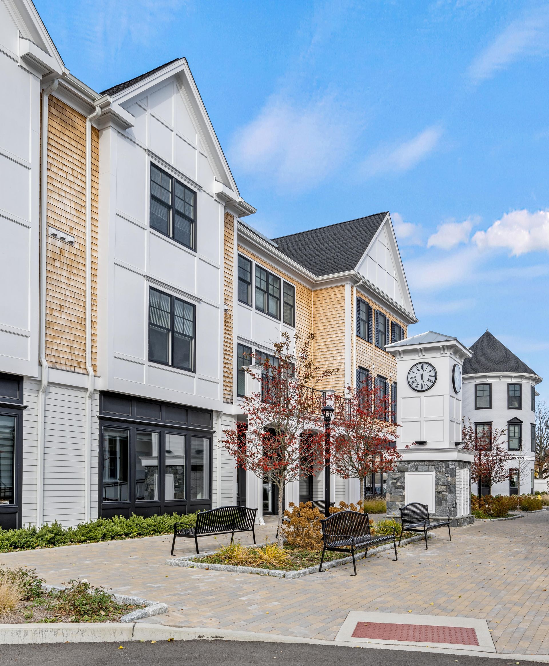 A large building with a clock on the side of it