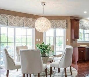 Living Room With White Chairs