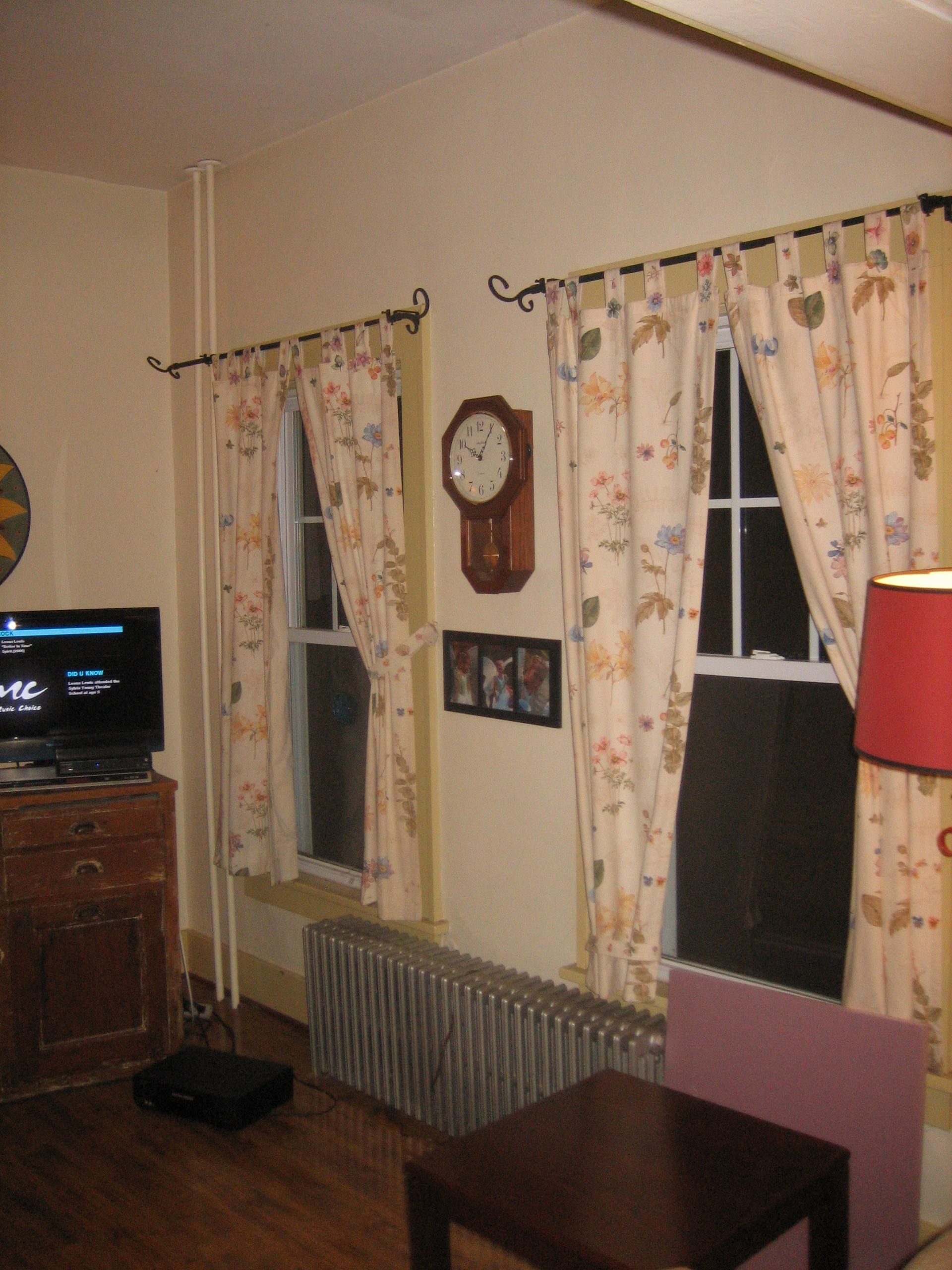 A living room with a clock on the wall