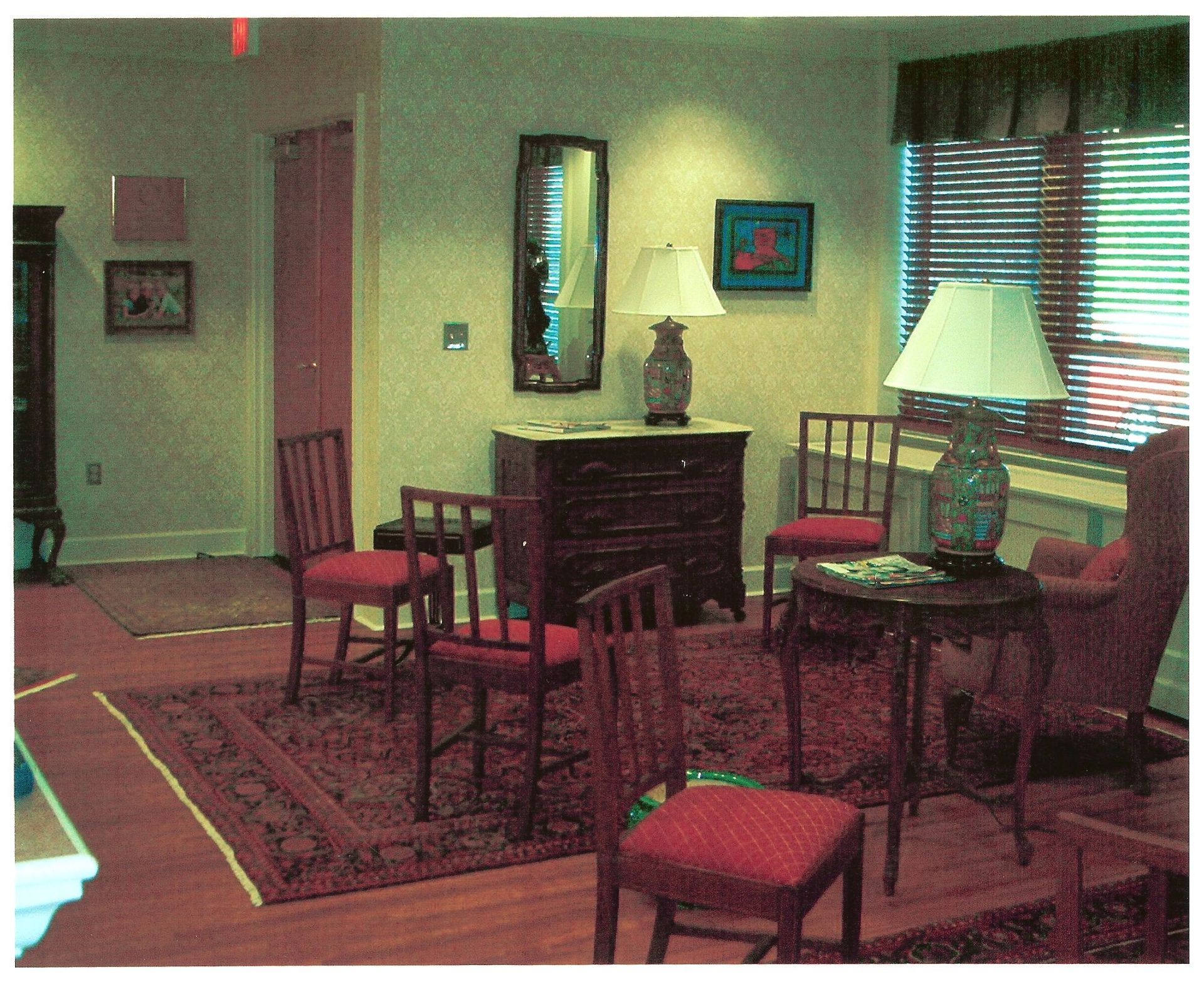 A living room filled with furniture and a lamp