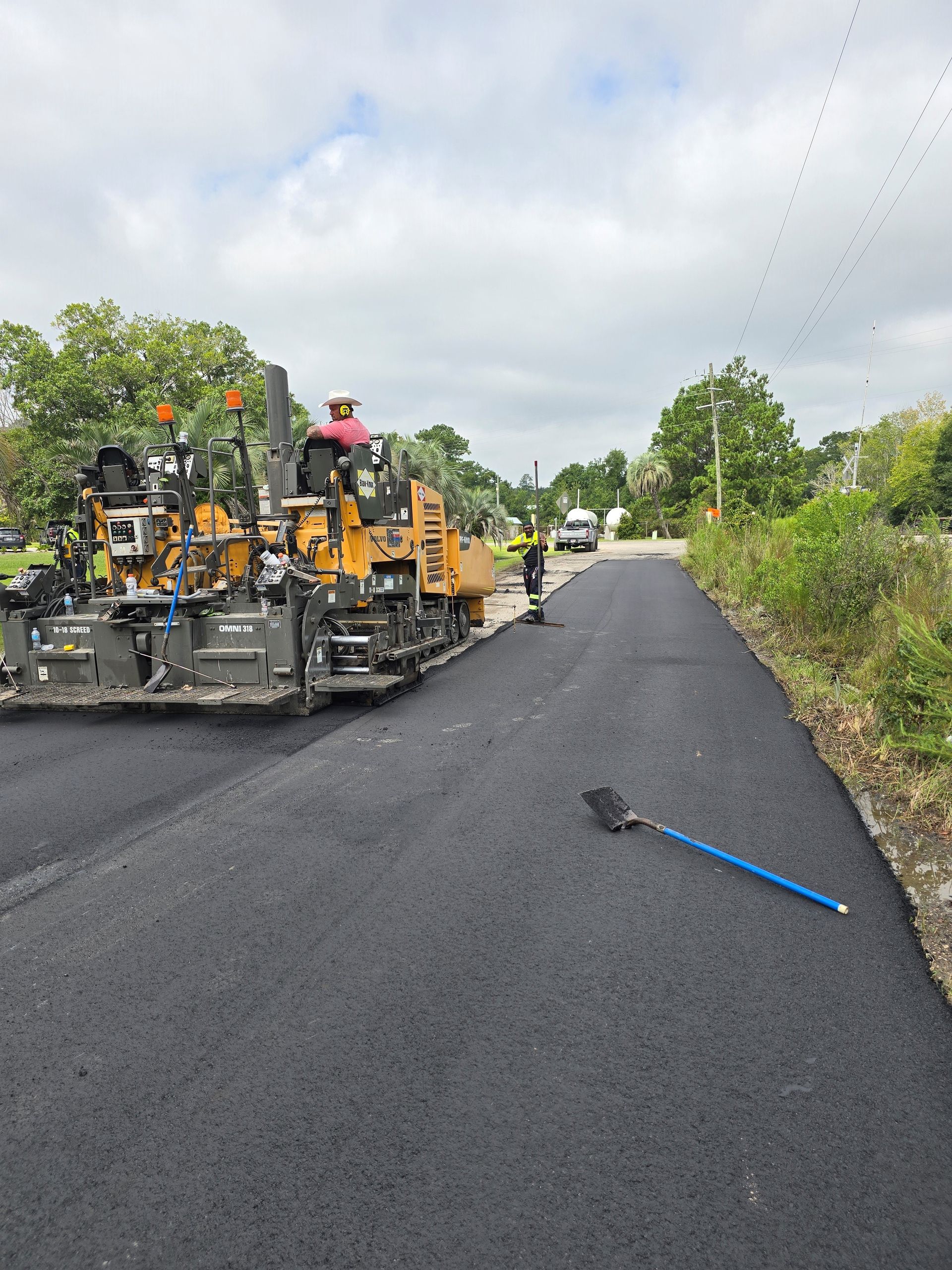 Road Undergoing Asphalt Paving — Jacksonville, FL — Pro Sealed Asphalt Inc.