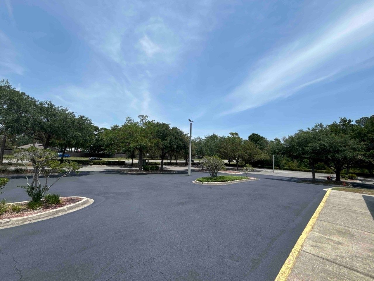 Brush Sealing Asphalt Paving — Jacksonville, FL — Pro Sealed Asphalt Inc.