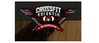 The logo for crossfit valentia is on a wooden floor.