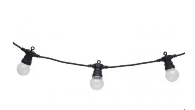 A string of lights with white bulbs on a white background.