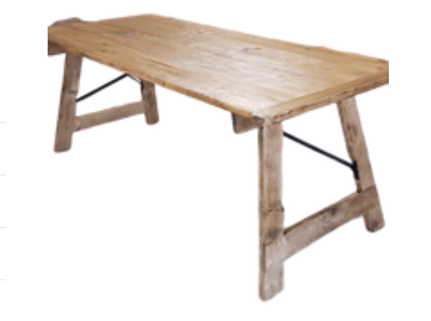 A wooden table with metal legs on a white background