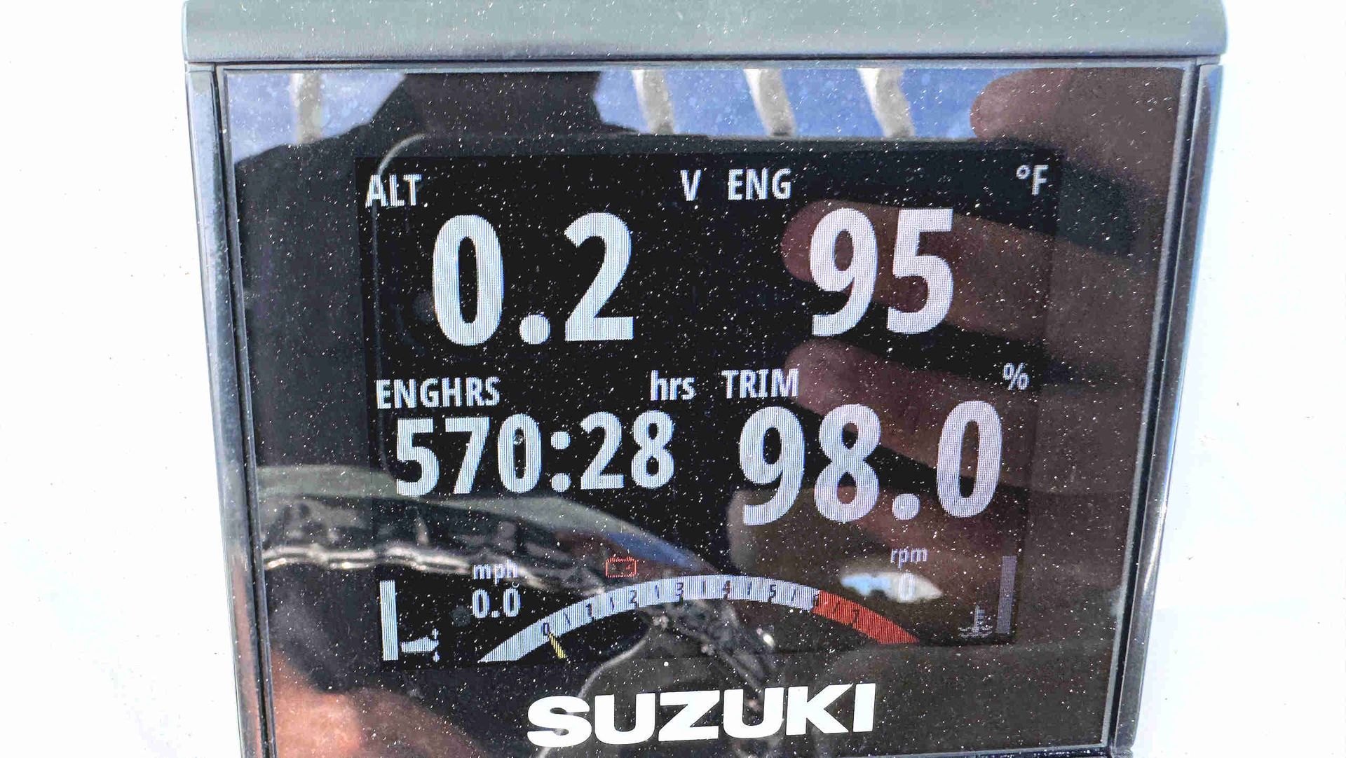 Suzuki dashboard showing speed 95, altitude 0.2, and odometer