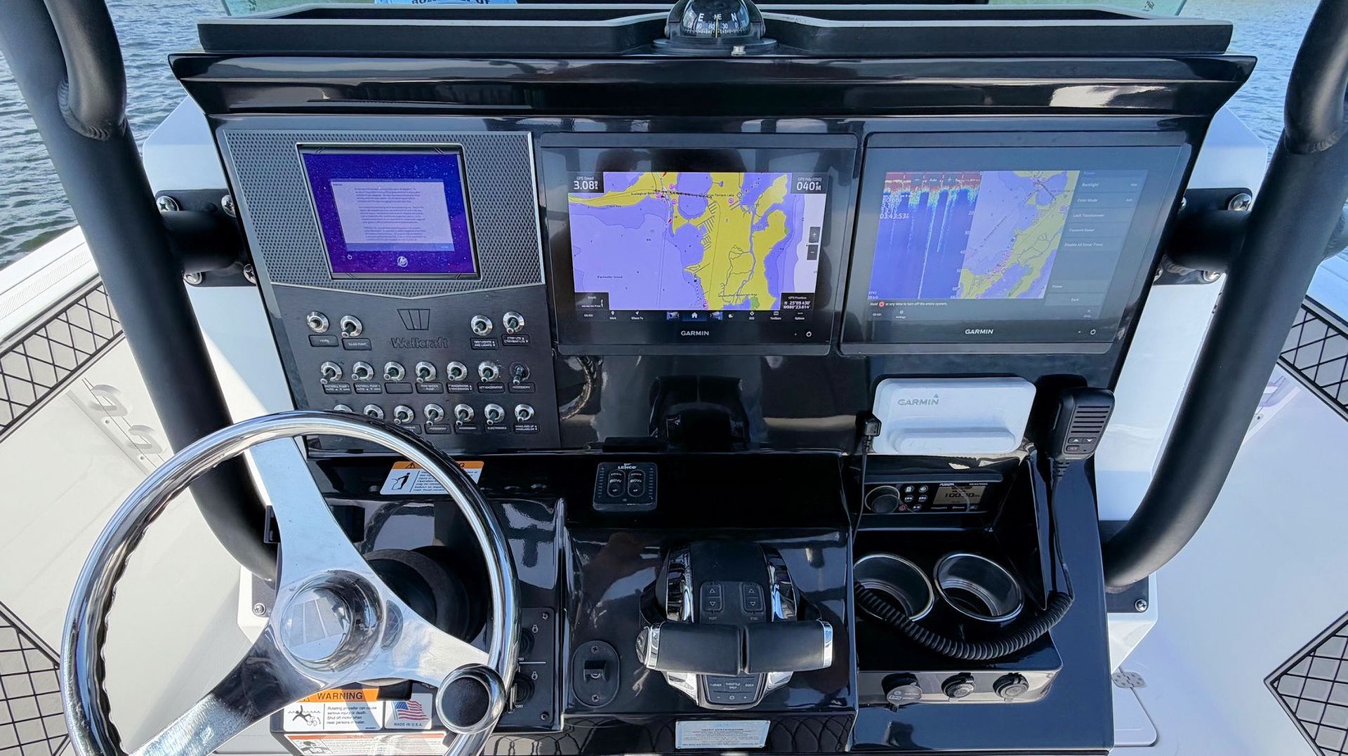 Helm with GPS/map displays, radio controls, and steering yoke visible