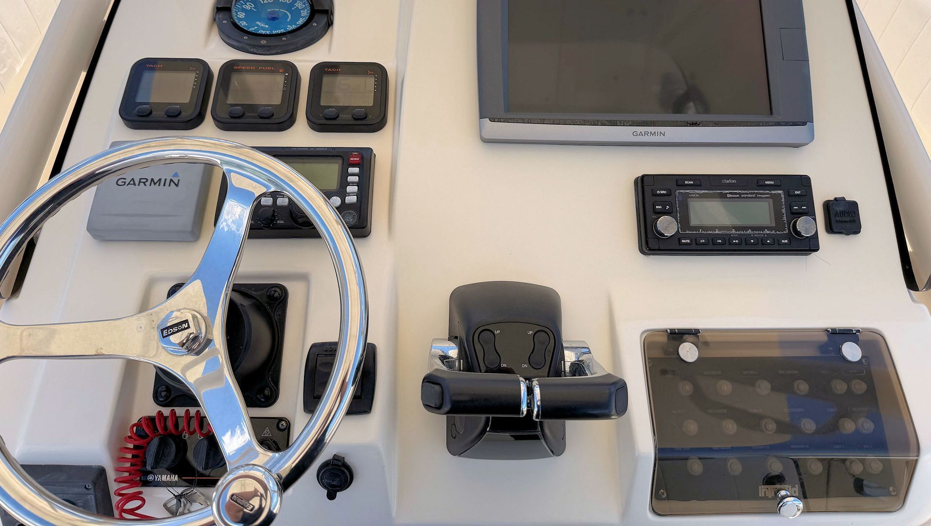 Assorted electronics and controller components on the helm station.