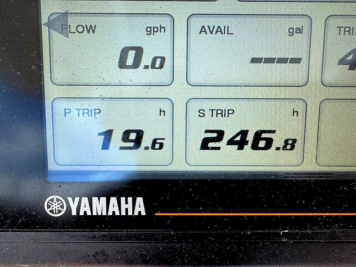 Yamaha boat display showing fuel flow, trip hours: 19.6 and 246.8, and available fuel.
