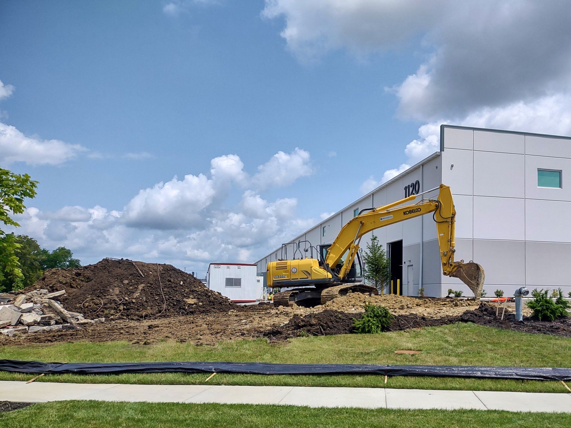 Men Works with Excavation at Night — Wilmington, OH — TH Solutions, LLC