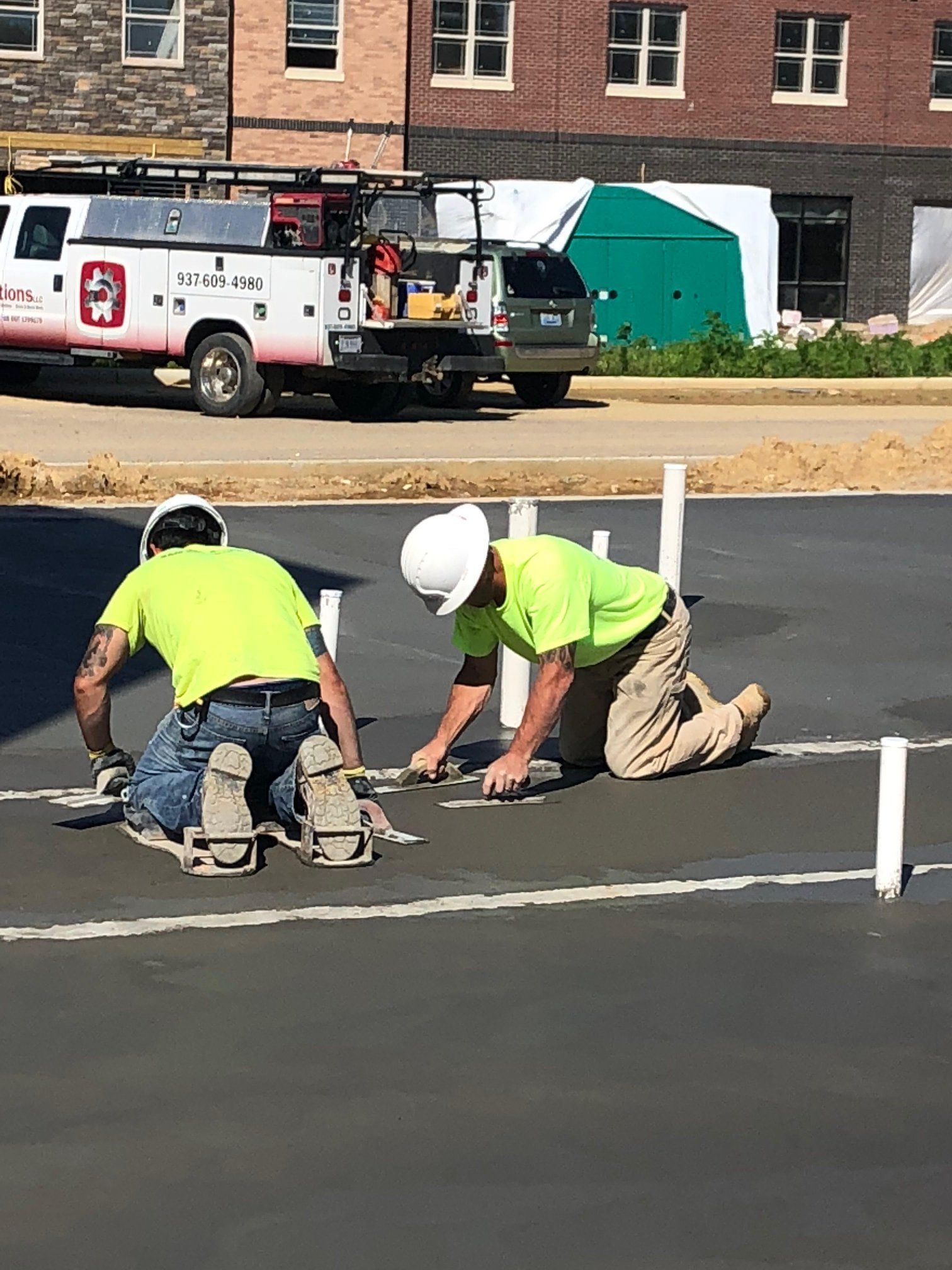 Two Men Paving Concrete — Wilmington, OH — TH Solutions, LLC