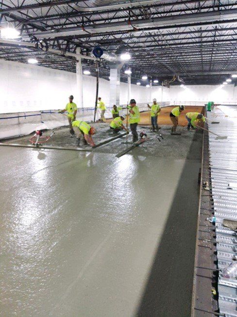 Workers Finishing Concrete — Wilmington, OH — TH Solutions, LLC