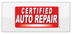 A red sign that says certified auto repair on it