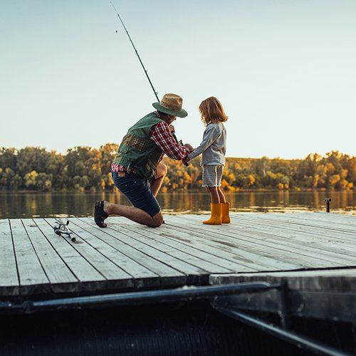 Grandfather and Grandson on a Fishing Adventure — Corsicana, TX — TMC Insurance Services LLC