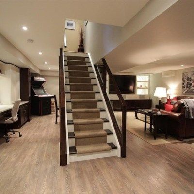 A basement with stairs leading up to the second floor