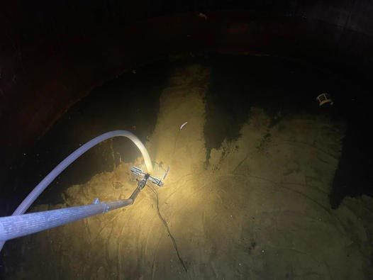 Using Long Vacuum Brush to Remove Dirt — CQ Water Tank Cleaning in Berserker, QLD