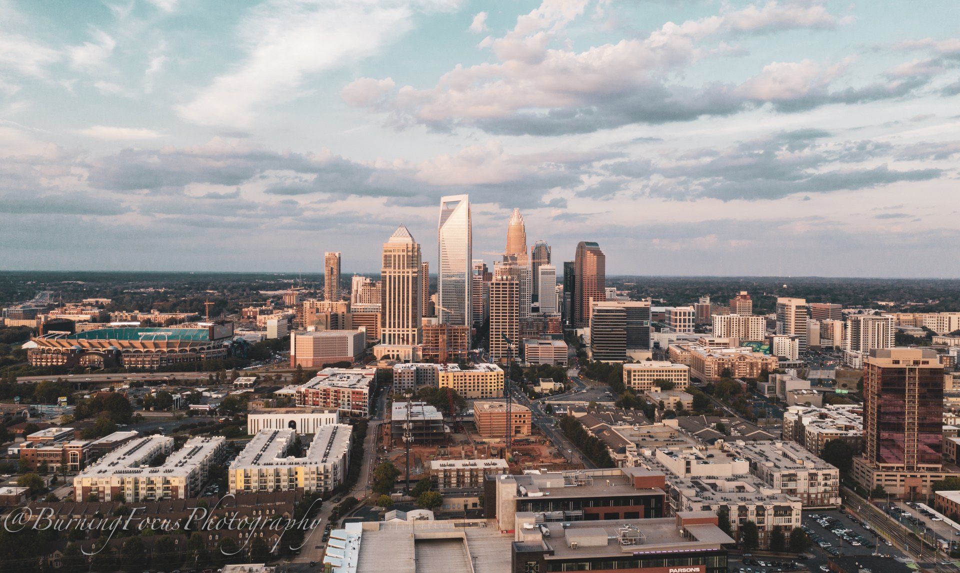 An aerial view of a city skyline on a cloudy day.