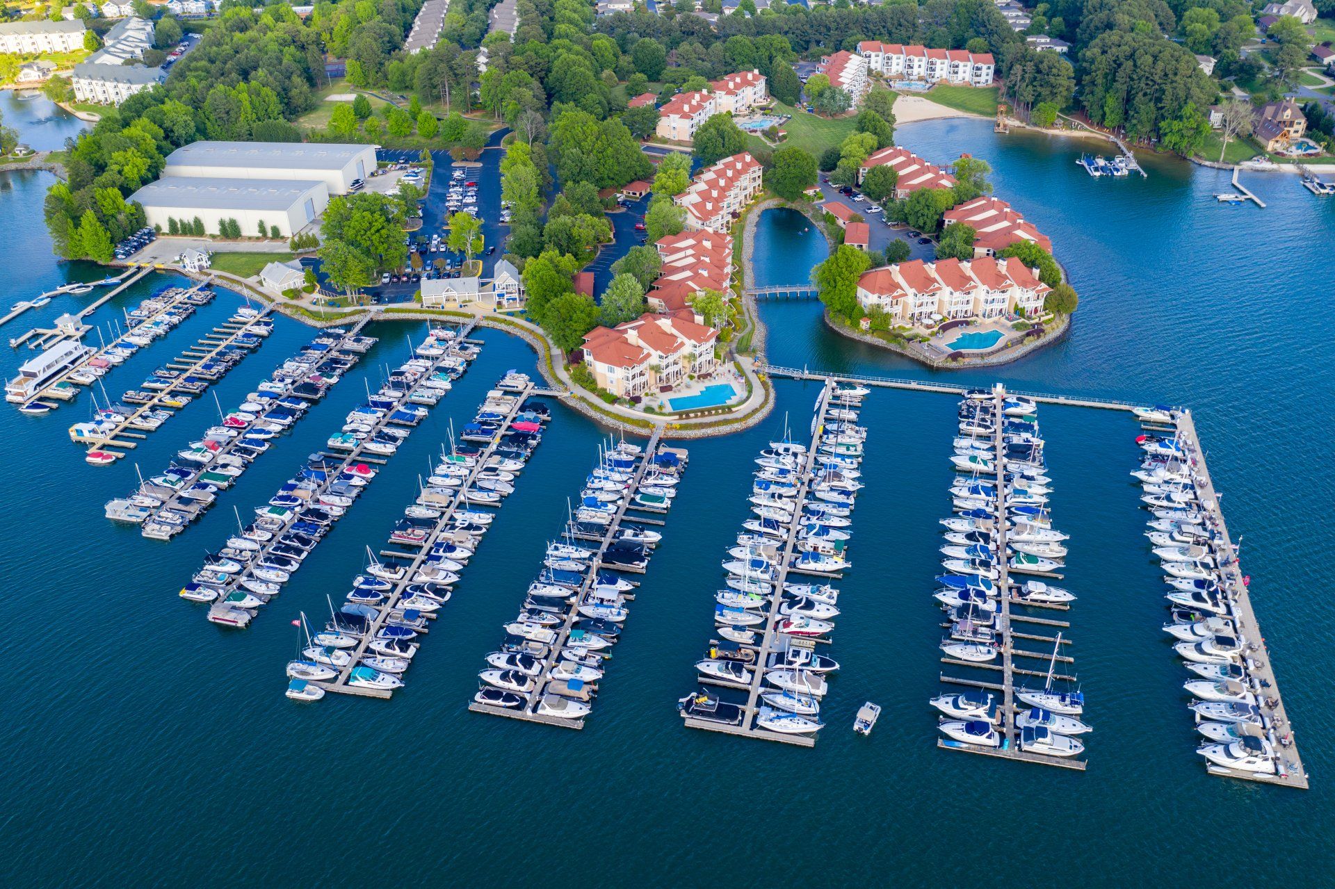 An aerial view of a marina filled with lots of boats