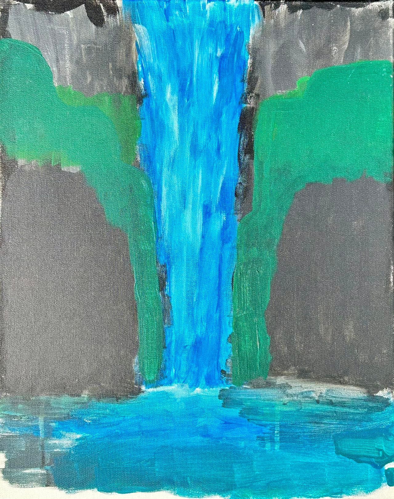 Waterfall cascading down a cliff face, with blue water, green foliage, and gray rocks.