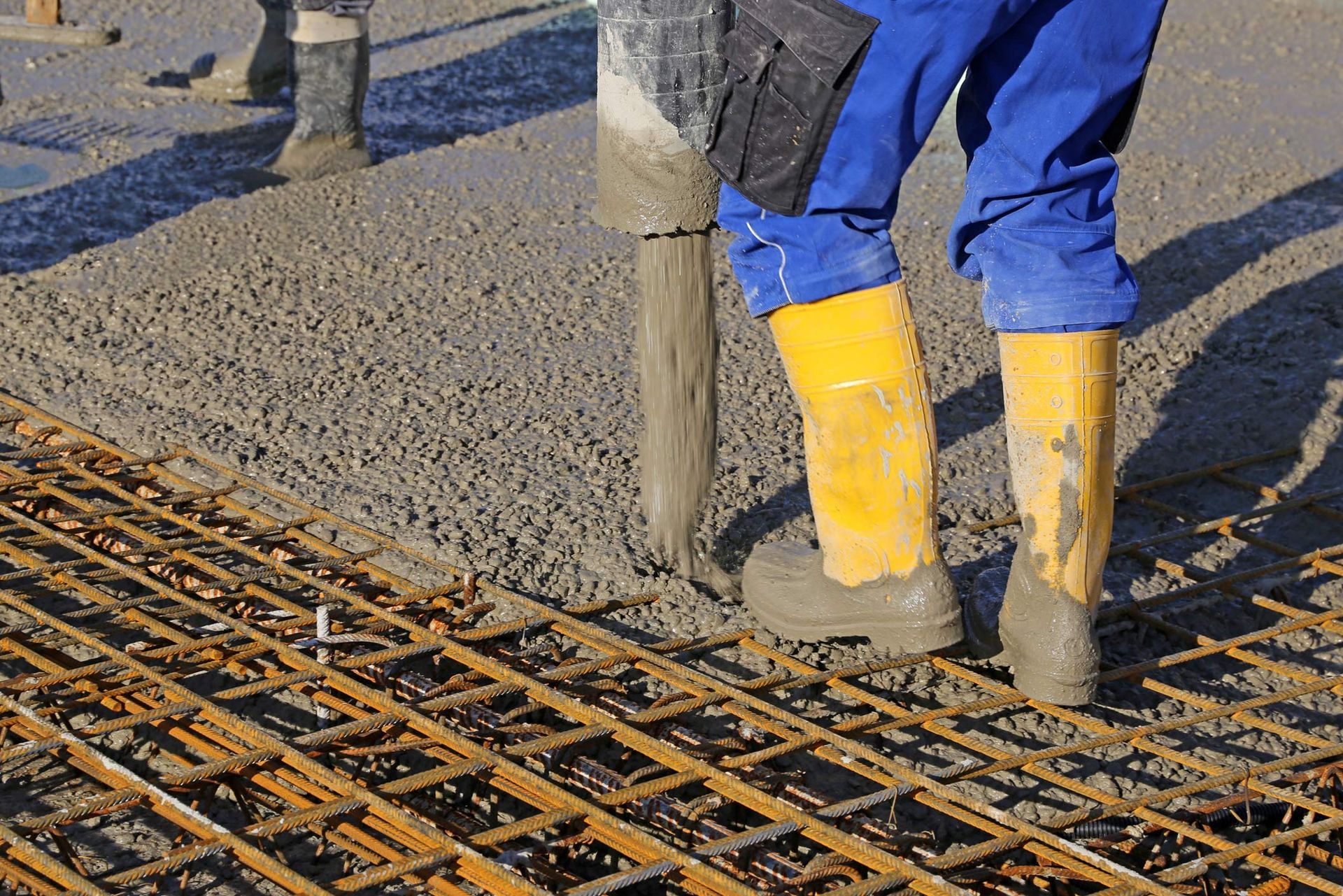 Concreting a base plate with ready-mixed concrete.
