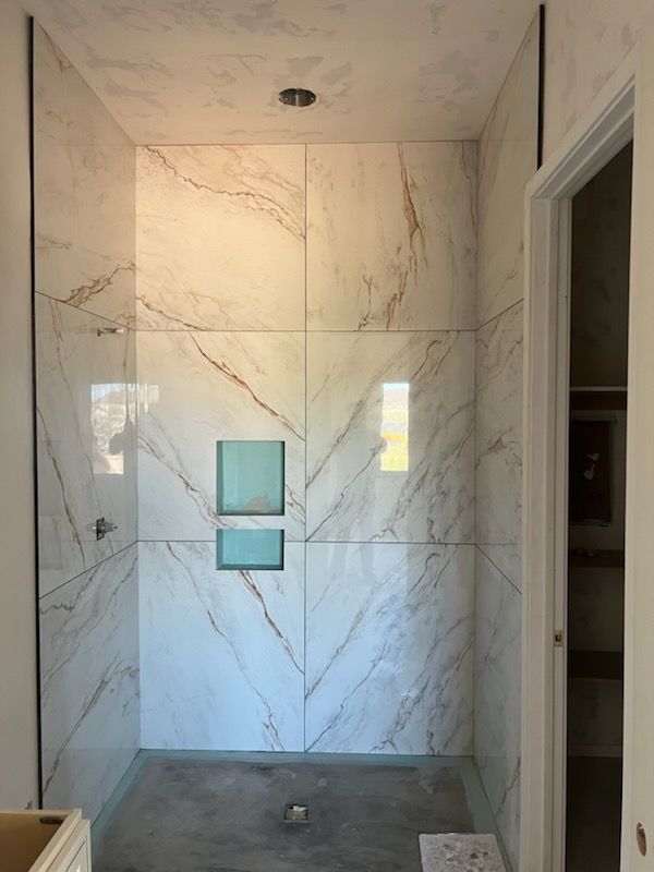 A remodeled tile walk in shower