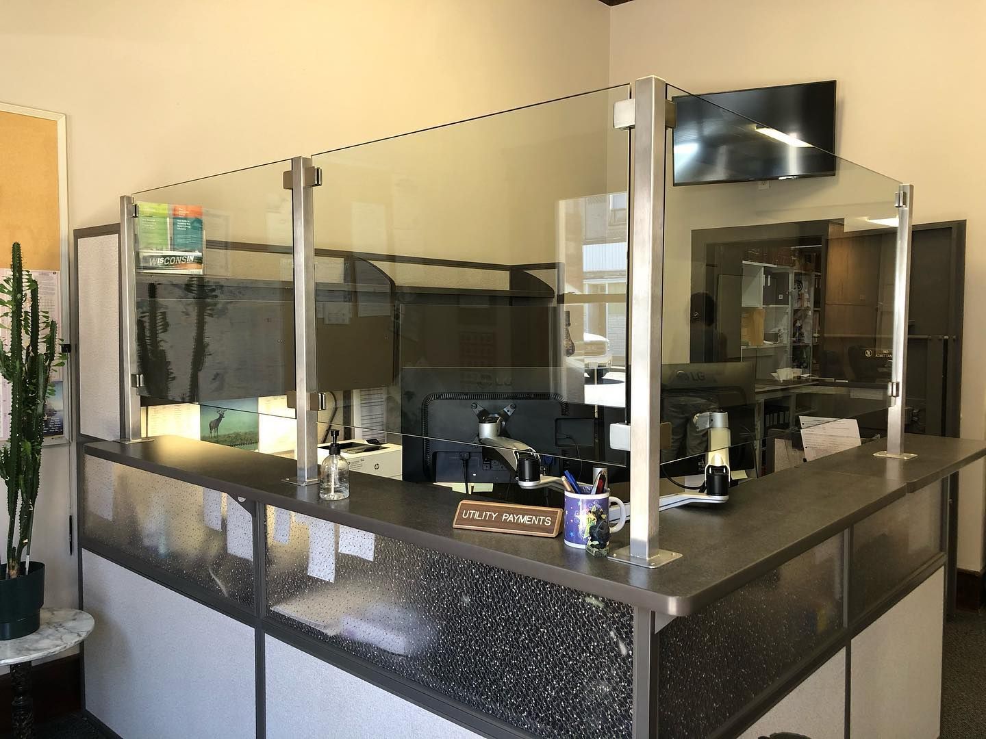 A Reception Desk With A Glass Barrier - Chippewa Falls, WI - Post Glass & Mirror, LLC