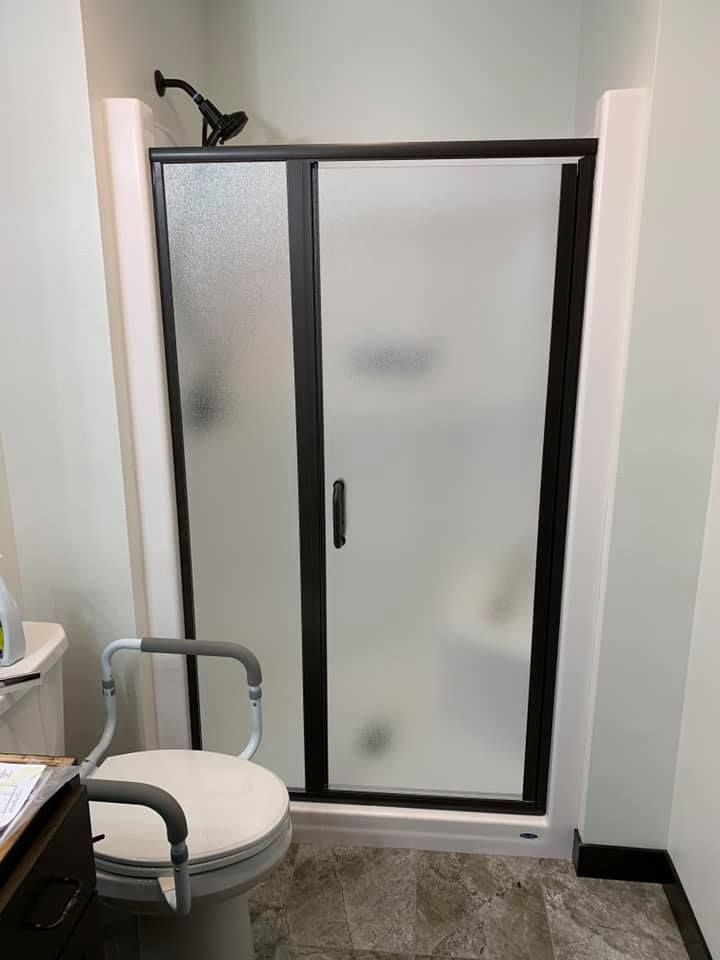 Bathroom with a Toilet and a Shower Stall - Chippewa Falls, WI - Post Glass & Mirror, LLC