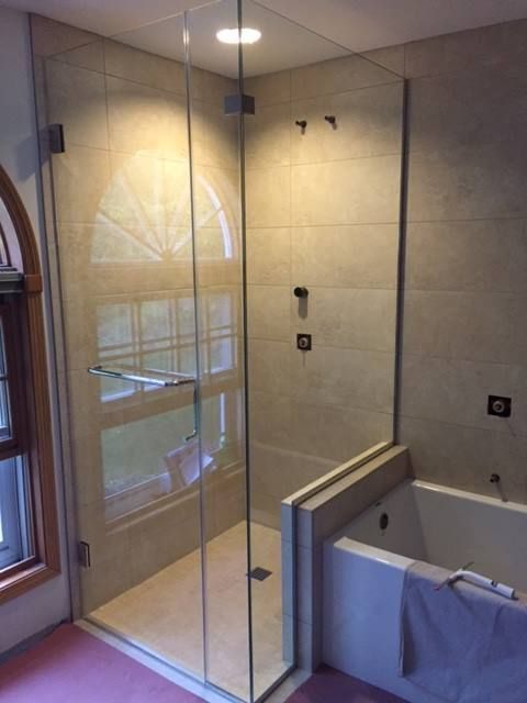 Bathroom with a Shower and a Bathtub - Chippewa Falls, WI - Post Glass & Mirror, LLC