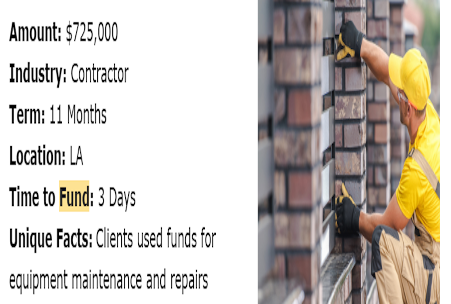 A man in a yellow shirt is working on a brick wall