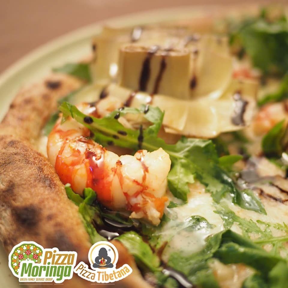 Particolare fetta di pizza