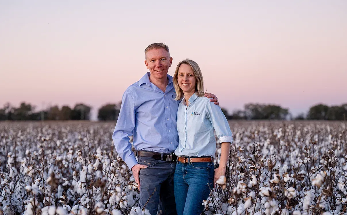 Peta and Tim Neale in a cotton field
